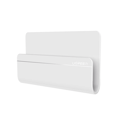 UGREEN - Soporte de Pared Adhesivo para Teléfono / Diseño de Montaje en Pared / Protección De Silicona Antideslizante / Anti Arañazos / Adhesivo 3M / Soporta Dispositivos 165*81*26.5 mm. / Caja De ABS / Color Blanco