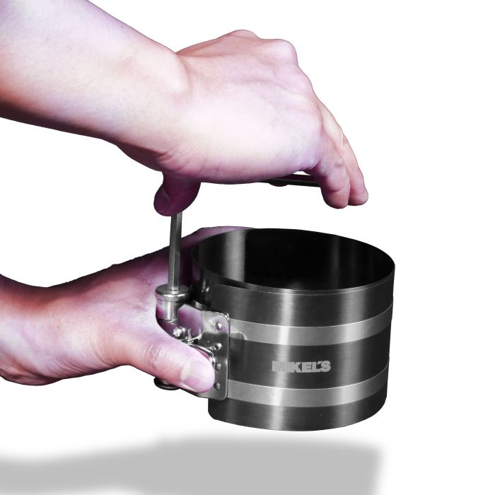 Opresor de anillos para pistón para motor a gasolina